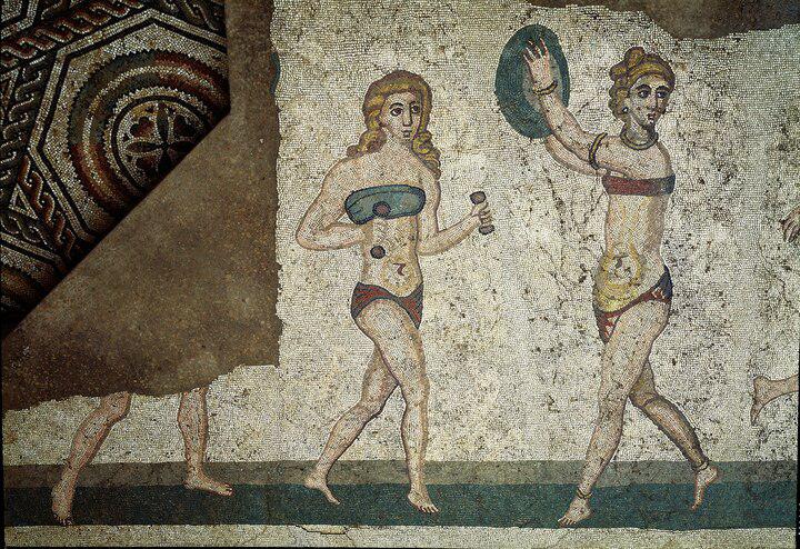 Roman women in a fourth-century A.D. mosaic from Sicily compete in an athletic contest while wearing<i> </i>an <i>amictorium, </i>a bandeau-type linen garment that bound the breasts.