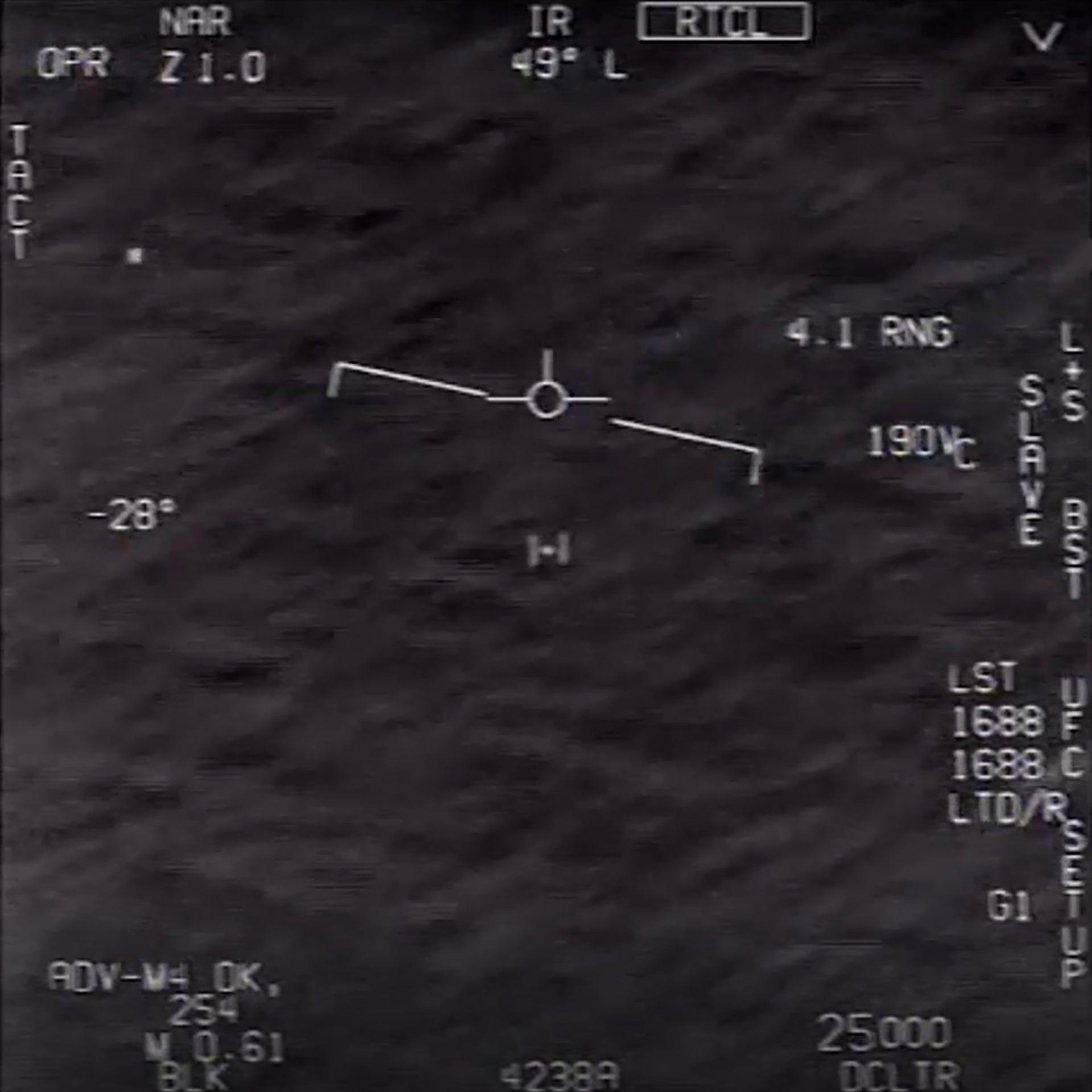 Black and white, low resolution GOFAST Video still of a U.S. Navy F/A-18 jet crew’s encounter with an unexplained anomalous phenomena (UAP)