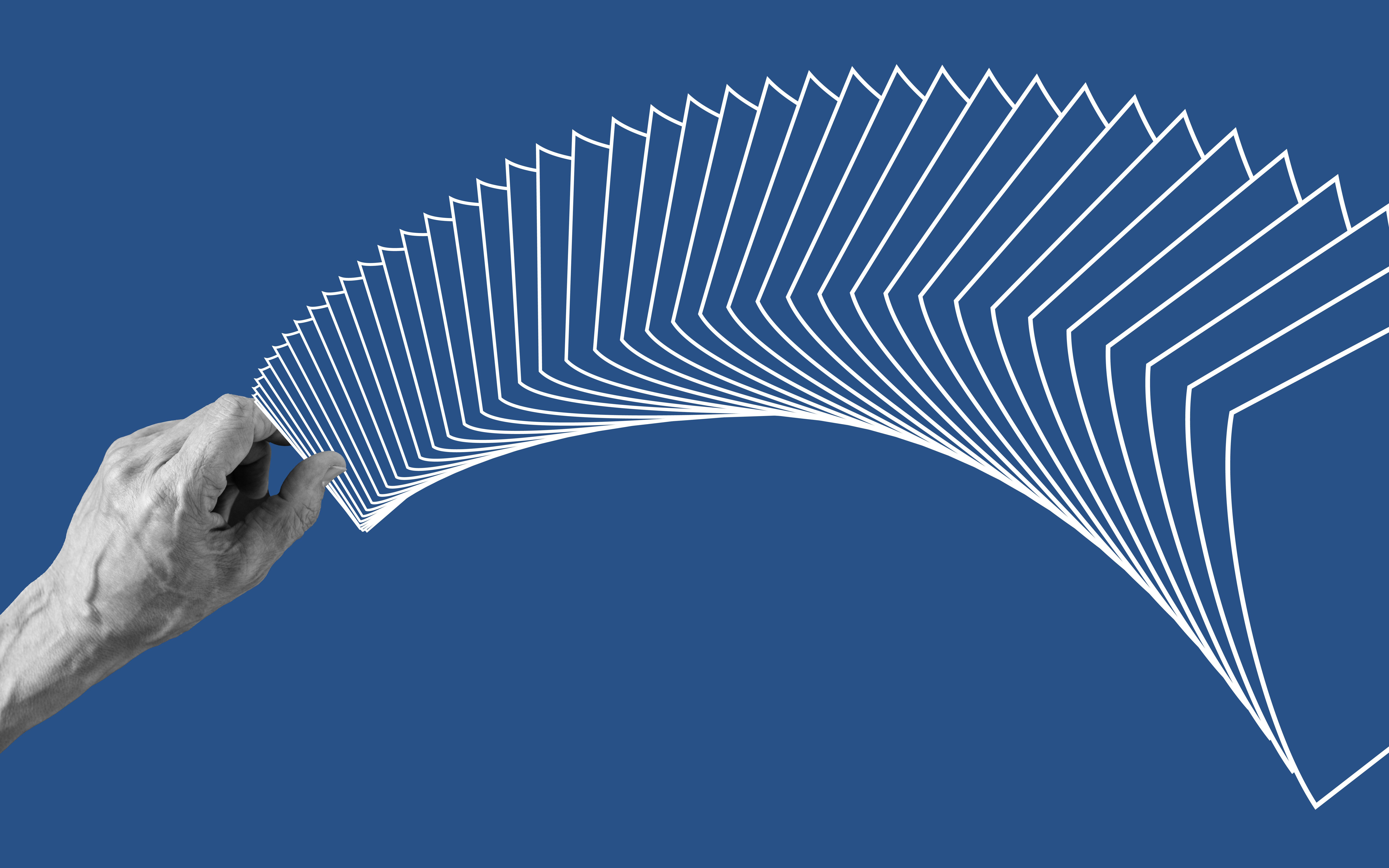 Human hand spreading a deck of cards