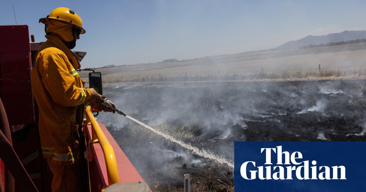 A firefighter conducts back burning on the outskirts of Dunkeld at Grampians national park in Victoria. Two bushfires were burning in the Grampians on Monday.
