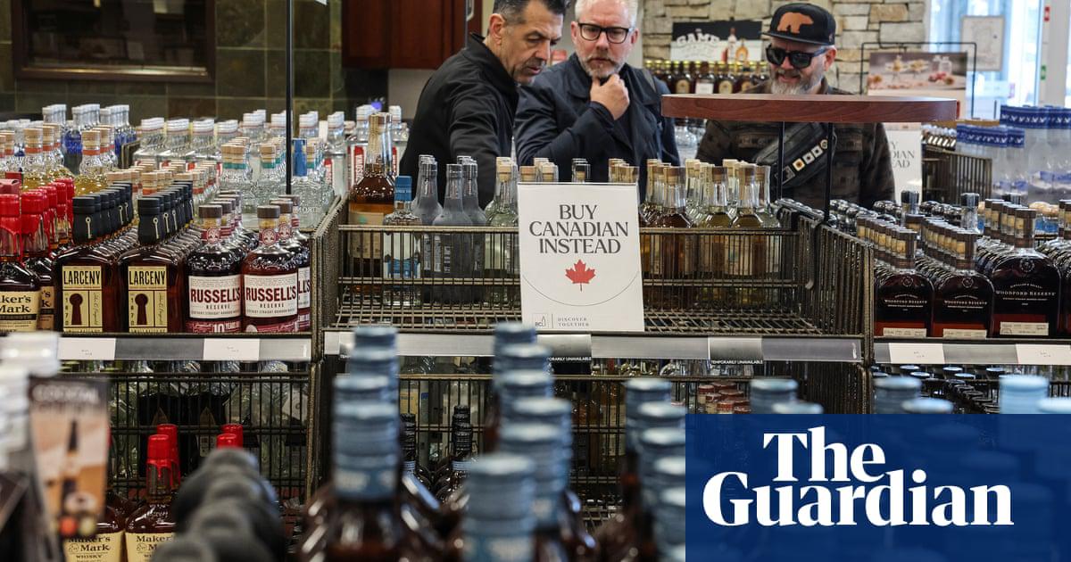 Empty shelves remain with signs ''Buy Canadian Instead'' after the top five US liquor brands were removed from sale at a British Columbia liquor store in Vancouver.