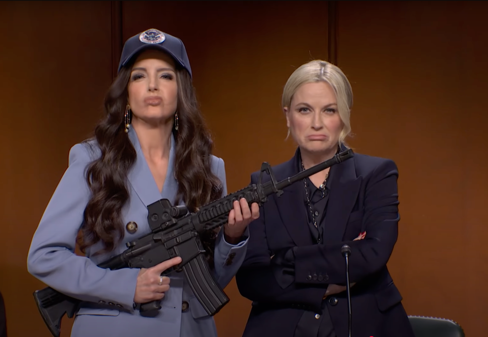 Kristi Noem (Tina Fey, in a surprise appearance) with Pam Bondi (Amy Poehler), spoofing Bondi’s appearance before the Senate Judiciary Committee.