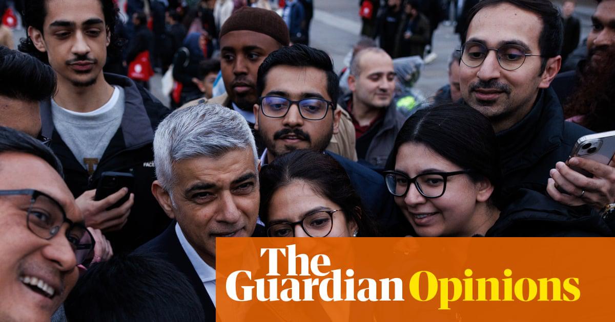 Sadiq Khan poses for a selfie at the open Iftar in Trafalgar Square, London, last year.