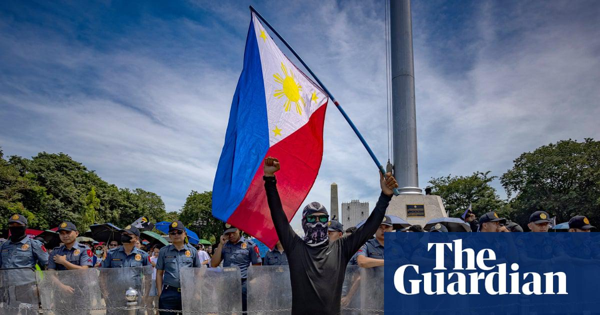 Filipinos take part in a protest against corruption at Rizal Park in Manila.