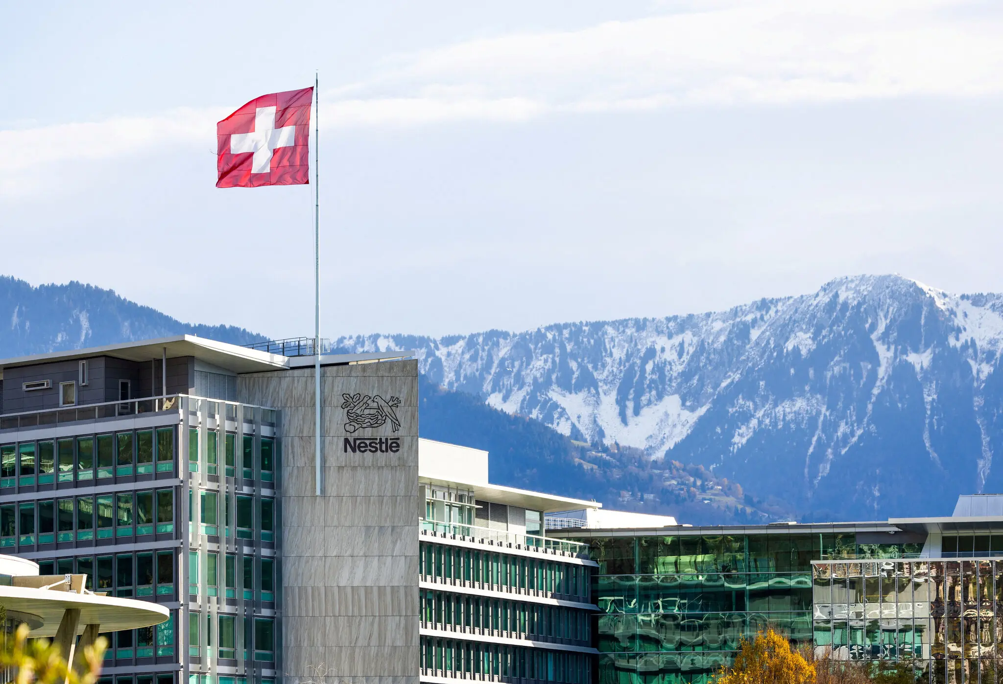 Nestlé is based in Vevey, Switzerland, and employs some 277,000 people around the globe. Its work force reduction will mostly affect white-collar jobs.