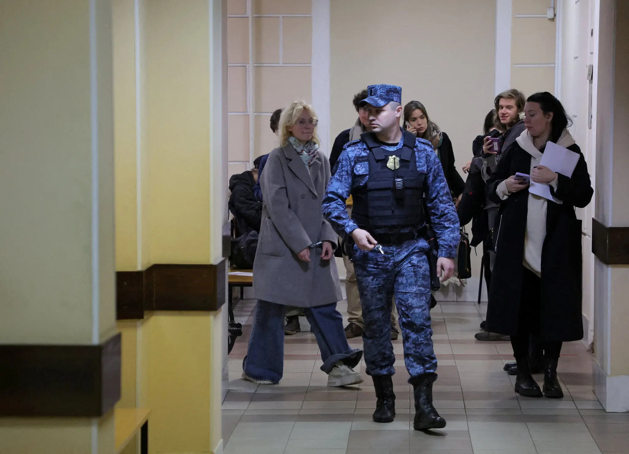 Diana Loginova, left, arriving for a court hearing in St. Petersburg, Russia, on Thursday.