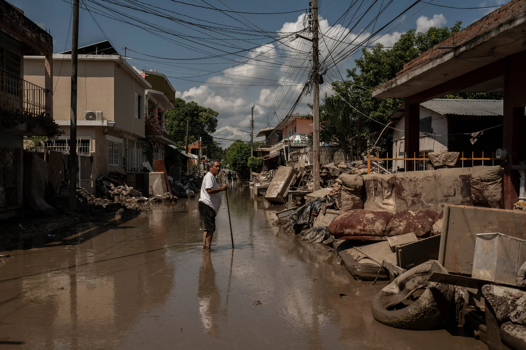 A street flooded in Poza Rica, Mexico, on Thursday. At least 70 people died in heavy rains that hit the country last week, officials said.