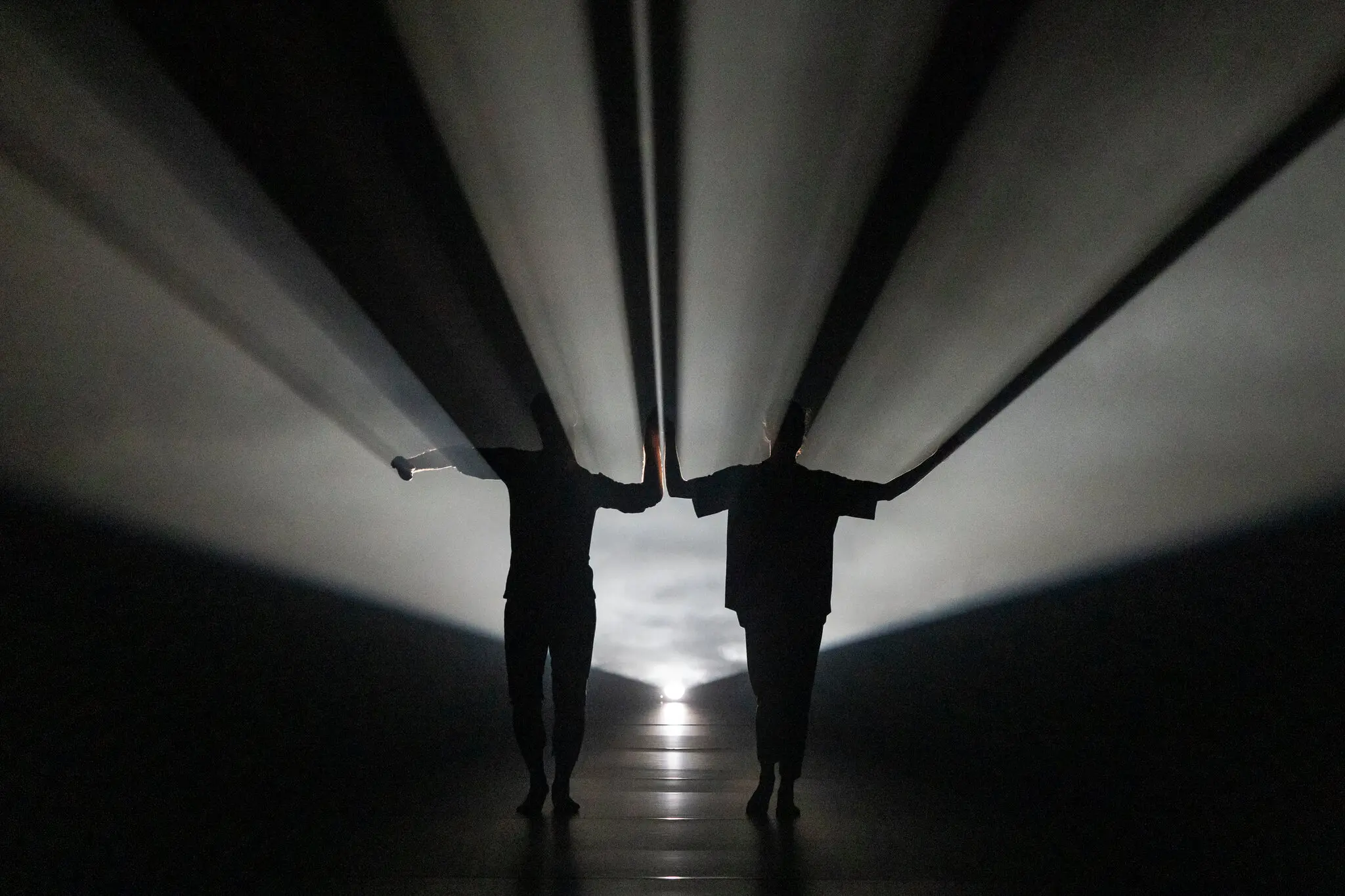 Two dancers performing in the U.S. premiere of “Larsen C,” choreographed by Christos Papadopoulos, as part of the Powerhouse: International, an arts festival.
