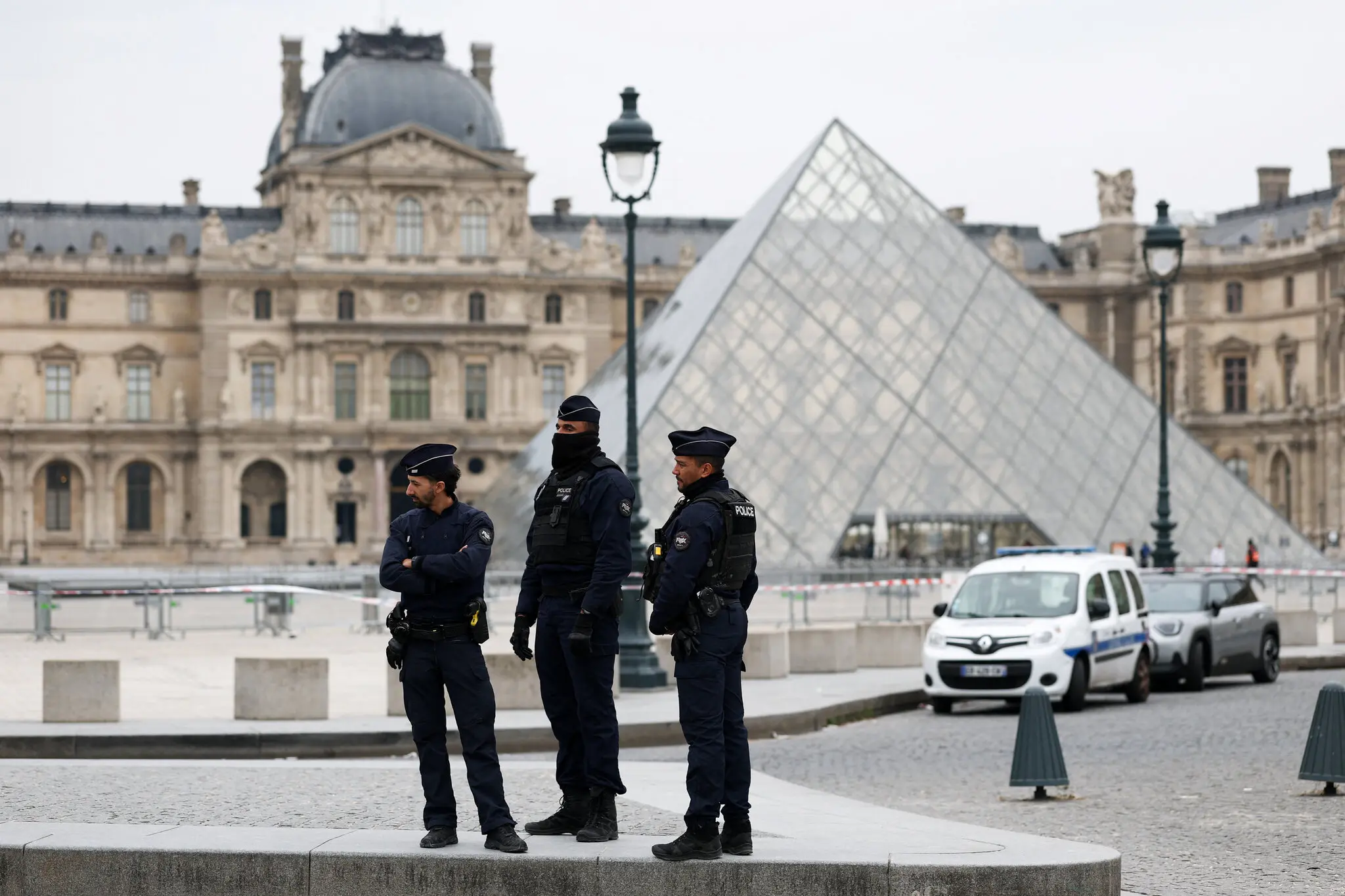 Police officers outside the Louvre Museum on Sunday.
