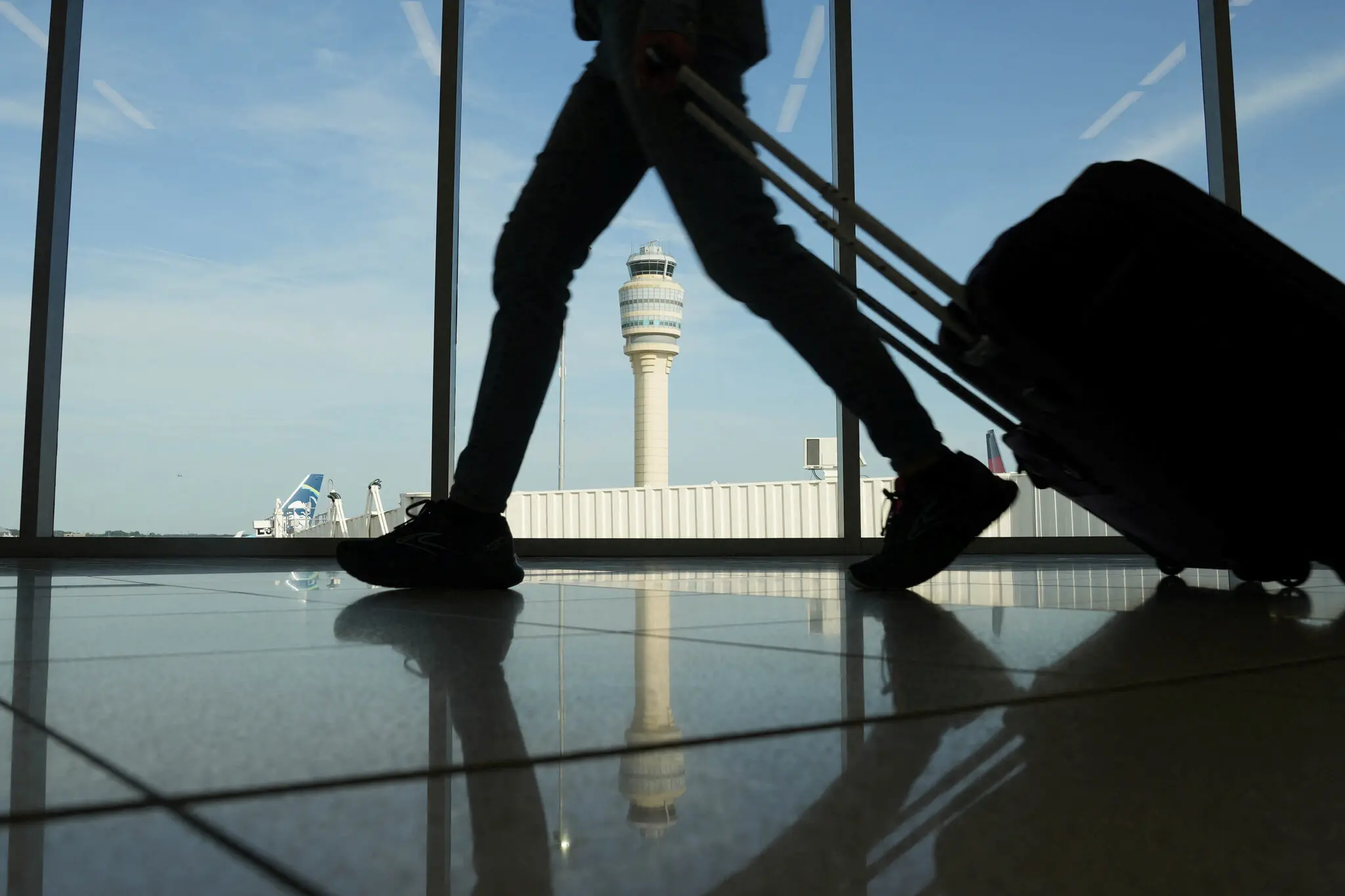 The authorities arrested a man who they said went to Hartsfield-Jackson Atlanta International Airport on Monday morning with plans to “shoot it up.”