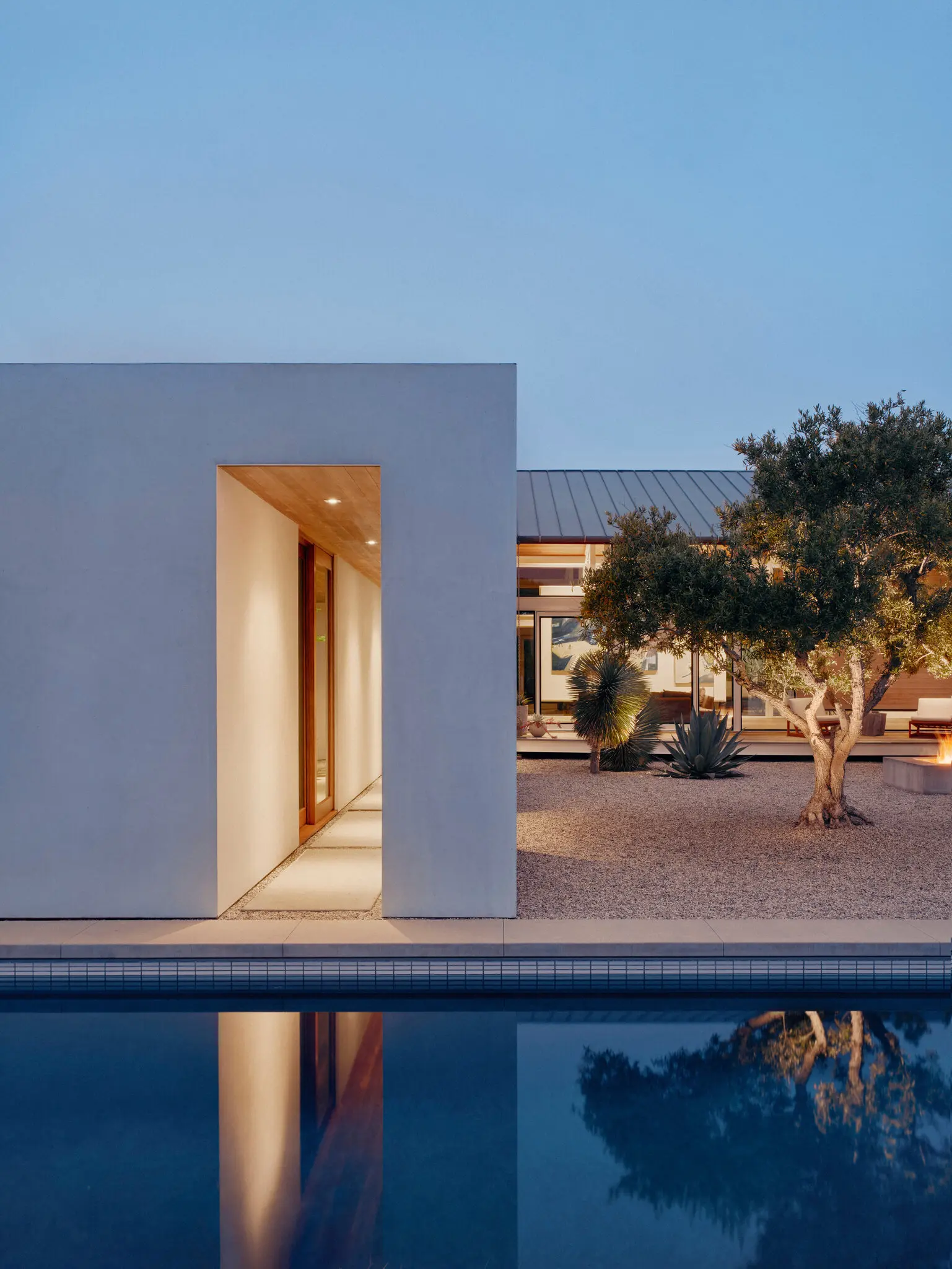 With courtyards and outdoor walkways, a home designed by Lake Flato embraces nature.