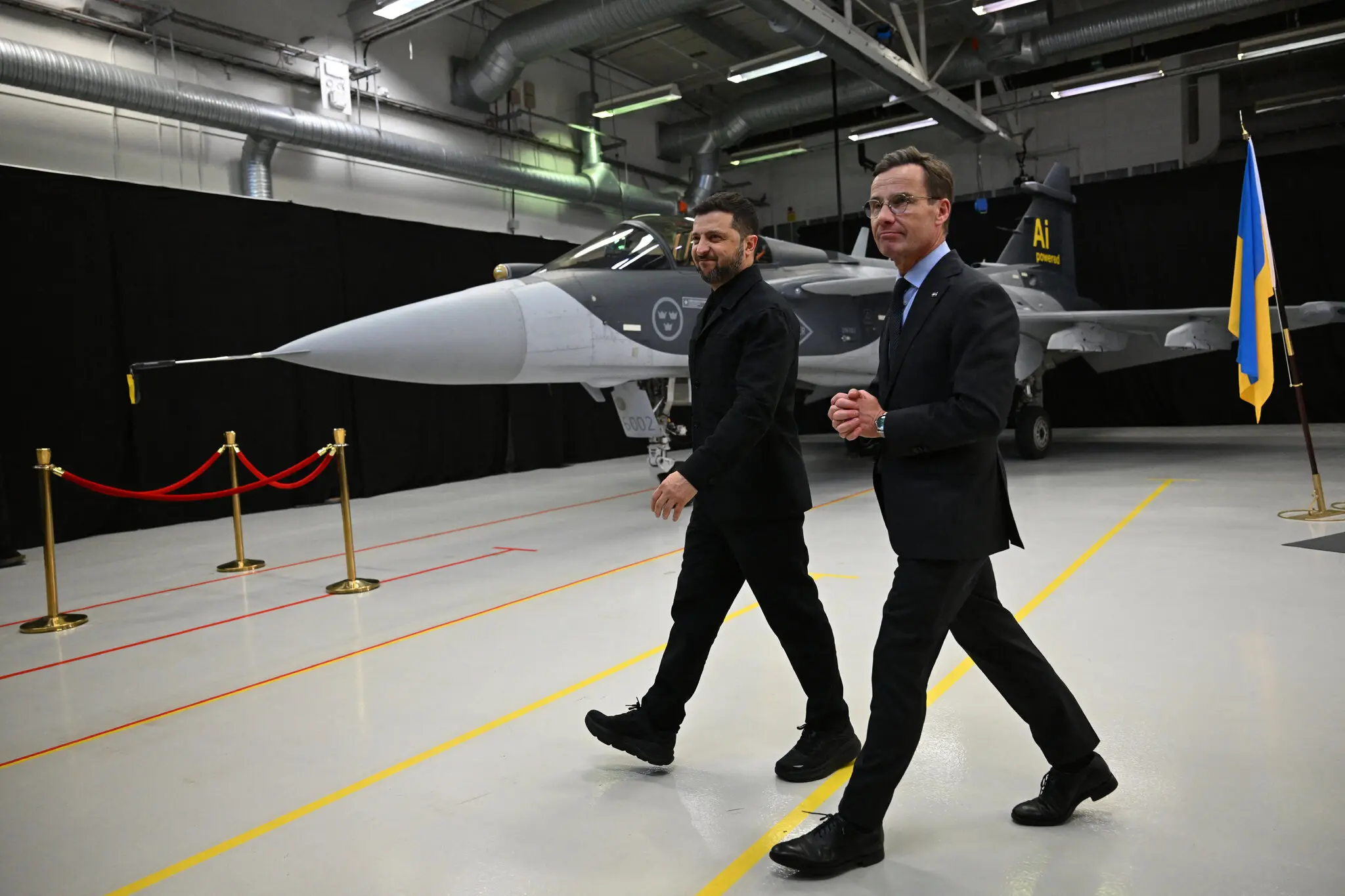 President Volodymyr Zelensky of Ukraine and Prime Minister Ulf Kristersson of Sweden with a Gripen fighter jet in Linkoping, Sweden, on Wednesday.