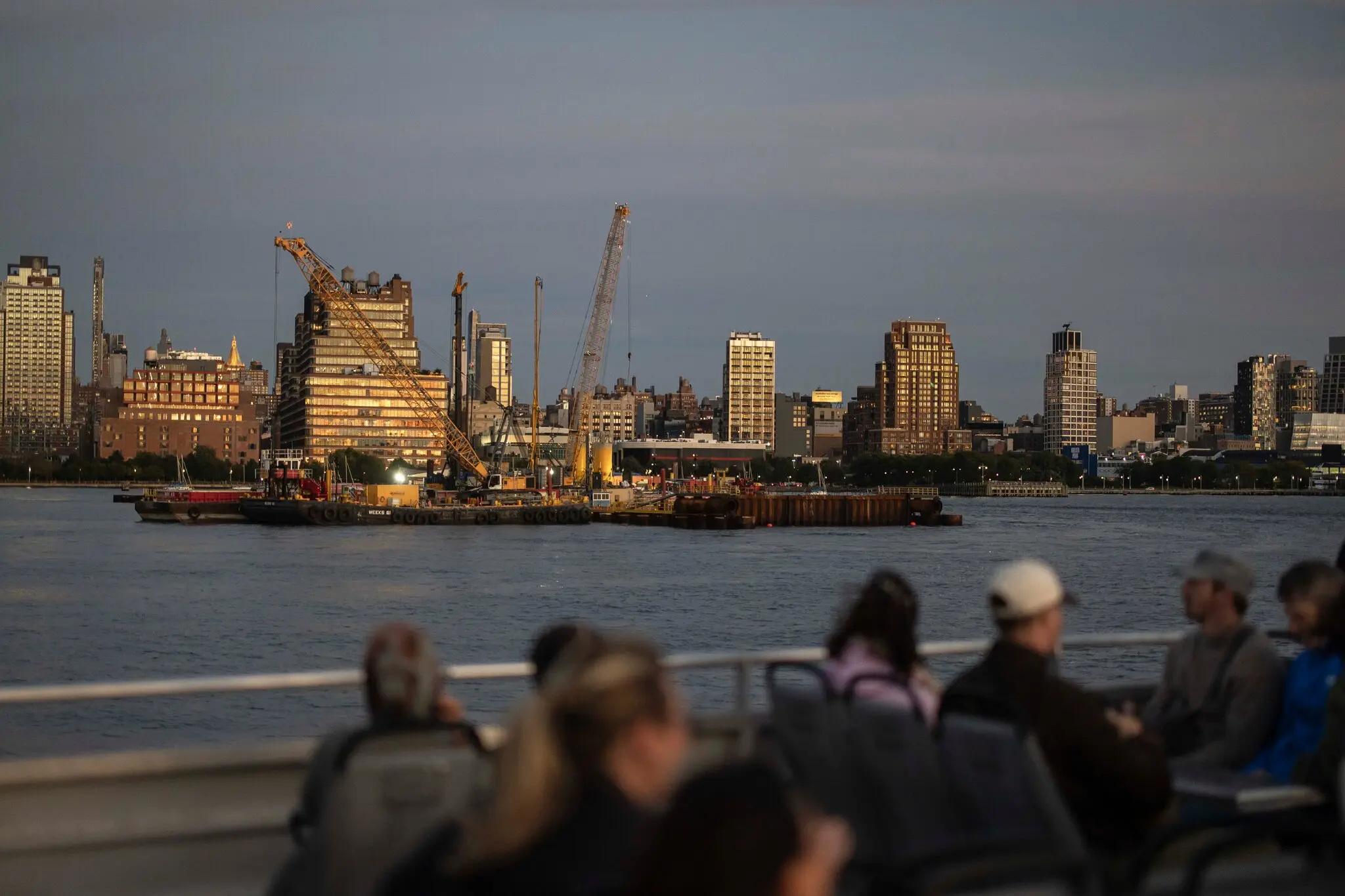 Barges and cranes mark the location where work is underway on a $16 billion rail tunnel project beneath the Hudson River to connect New Jersey with Manhattan’s Penn Station.