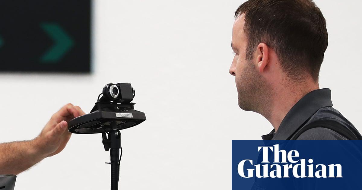 A US Customs and Border Protection uses a camera in 2018 in Miami, Florida.