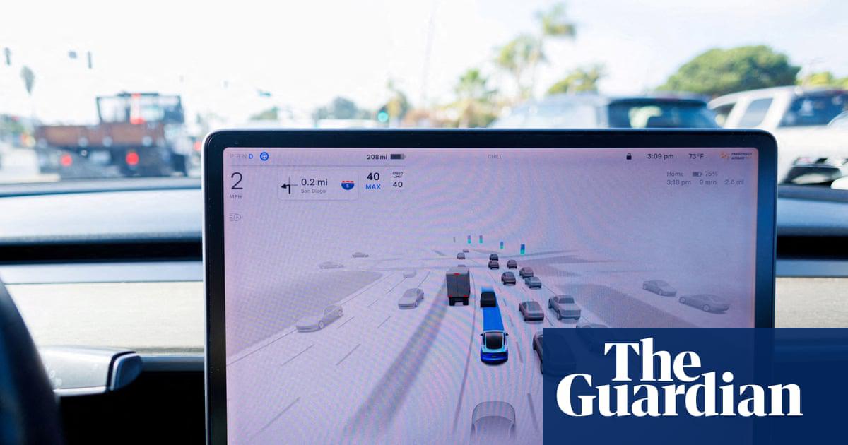 A Tesla Model 3 vehicle drives using full self-driving in Encinitas, California, on 18 October 2023.