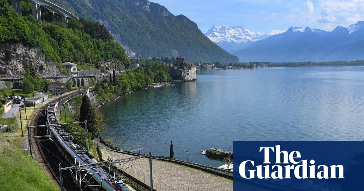Train leaving Montreux railway station on Lake Geneva in Switzerland.