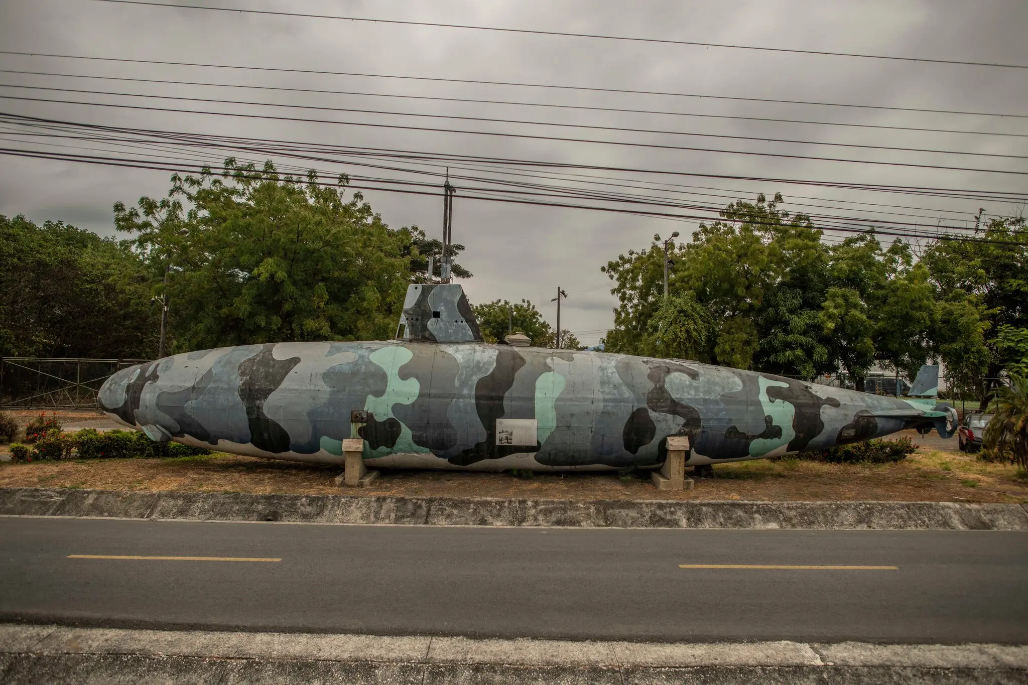 A submarine that Ecuadorean officials say was used by drug cartels, on display at the entrance of a naval base in Guayaquil.