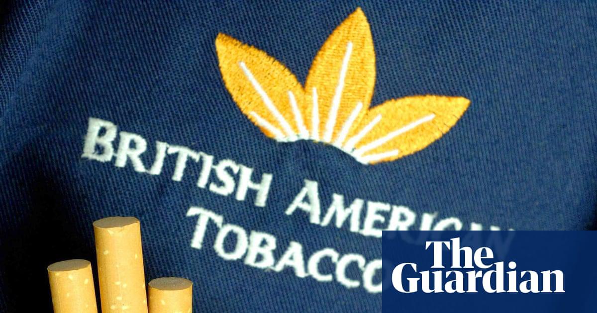 Cigarettes in a British American Tobacco worker's shirt pocket. Lord Strathcarron described his contact at the firm as ‘barely family’.