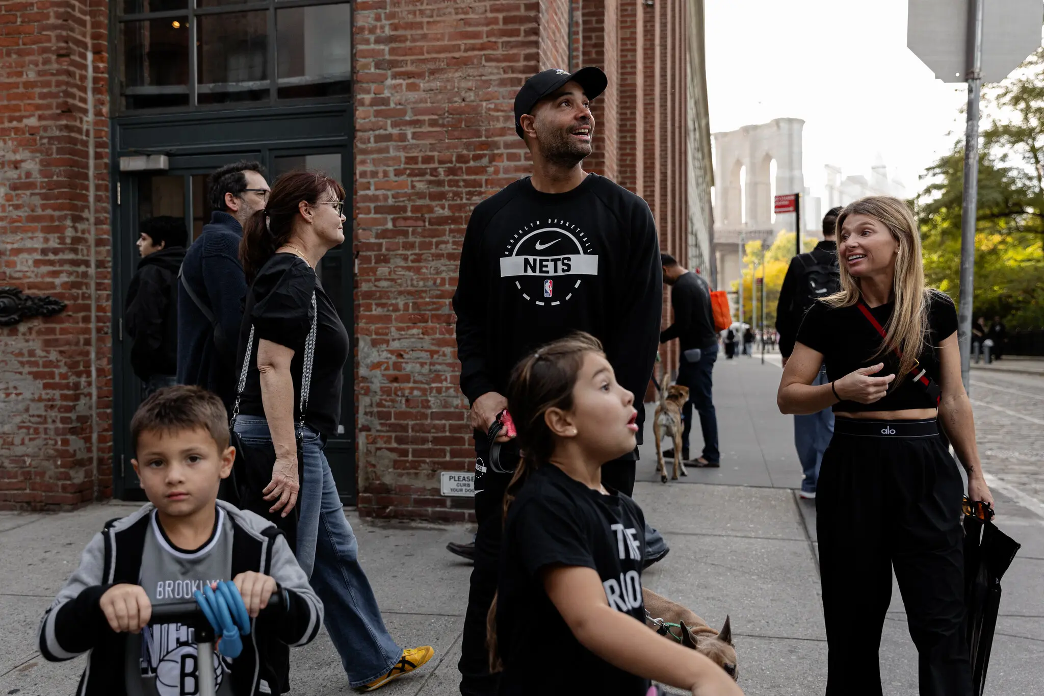Jordi Fernández, the head coach of the Brooklyn Nets, center, said he tries to make the most of his time with his family when he’s not traveling with the team.