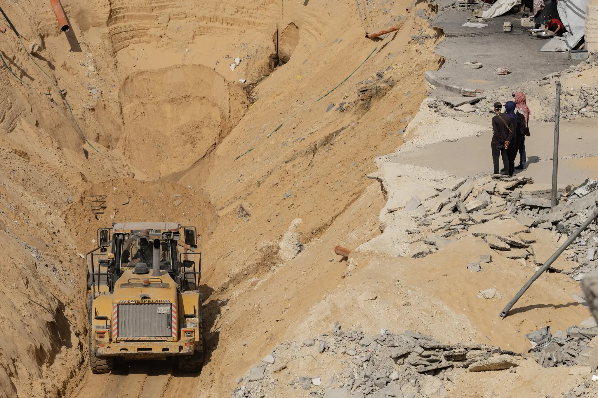 Searching for the bodies of hostages in the rubble of Khan Younis, in southern Gaza, earlier this month. An Egyptian team was sent to help on Saturday.