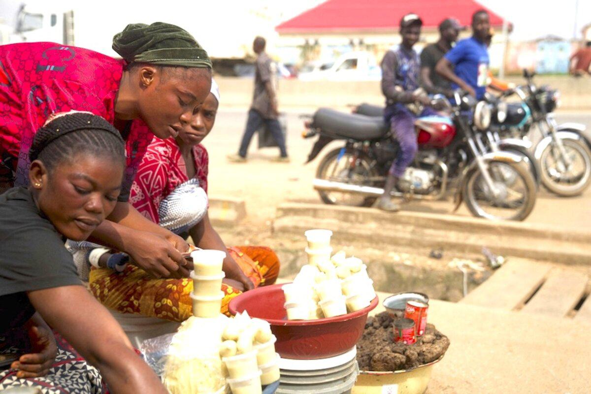 Women sell shea butter in Abuja, the capital city of Nigeria, which has just been taken off a global financial watchlist. 