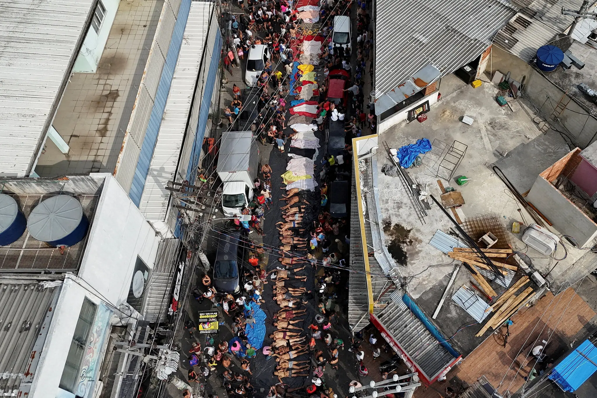 Bodies of men retrieved from an area of Rio de Janeiro that was the target of a police raids on Tuesday.