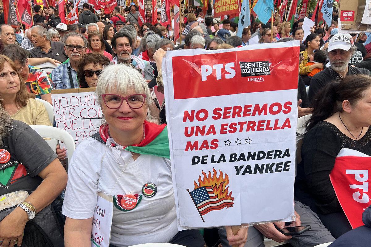 Claudia Ferdeghini protests against U.S. President Donald Trump’s “new economic Monroe Doctrine,” in Buenos Aires, Argentina, Oct. 22, 2025. She says Mr. Trump is most interested in plundering Argentina’s natural resources, including rare earth minerals. 