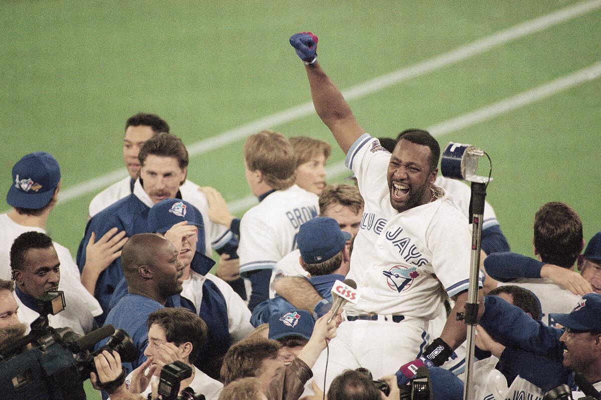 Toronto's Joe Carter gets a victory ride on his teammates' shoulders after his World Series-clinching home run in the ninth inning of Game 6 against the Philadelphia Phillies, Oct. 23, 1993.