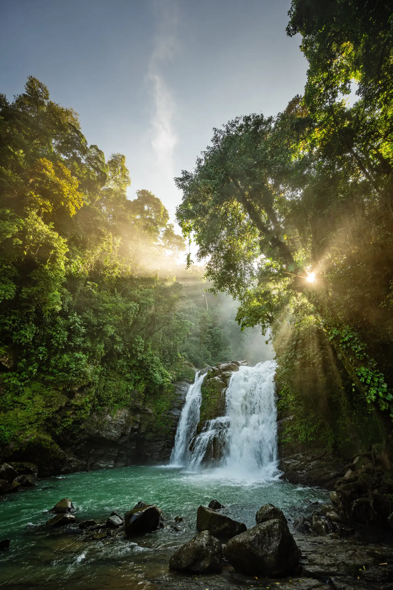 The two-tiered cascade of Nauyaca Waterfalls creates a natural swimming pool in the Barú River.