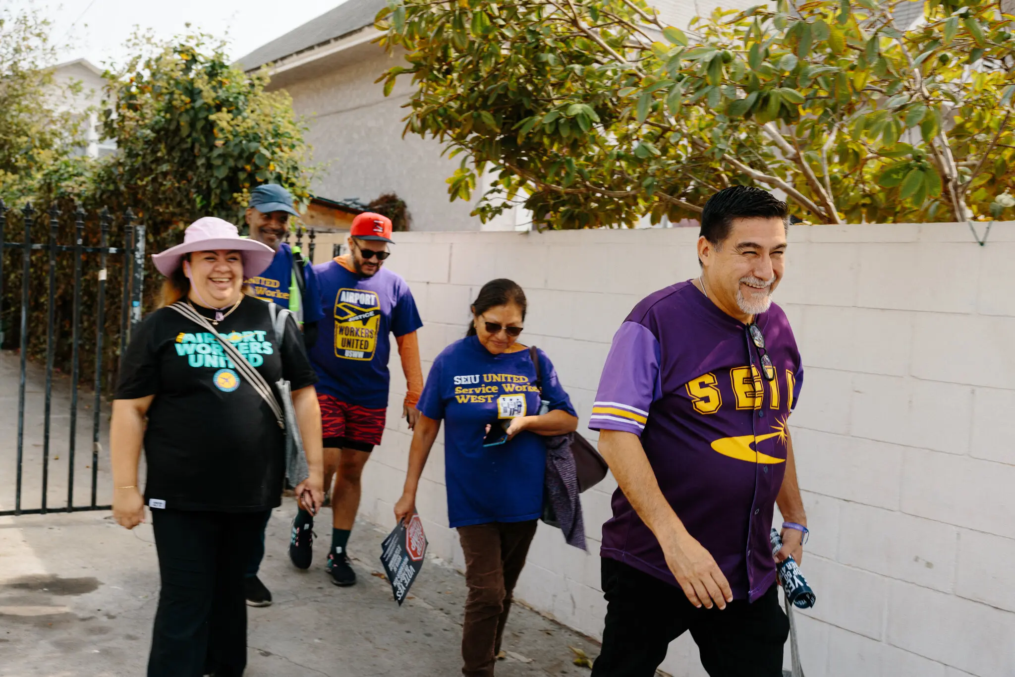 David Huerta, the president of S.E.I.U.’s local chapter, right, and other union members have told voters that Proposition 50 was their chance to stop President Trump.