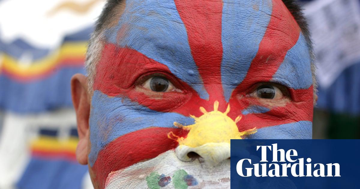 A festivalgoer at Womad’s old home in Charlton Park, Wiltshire, in 2011.