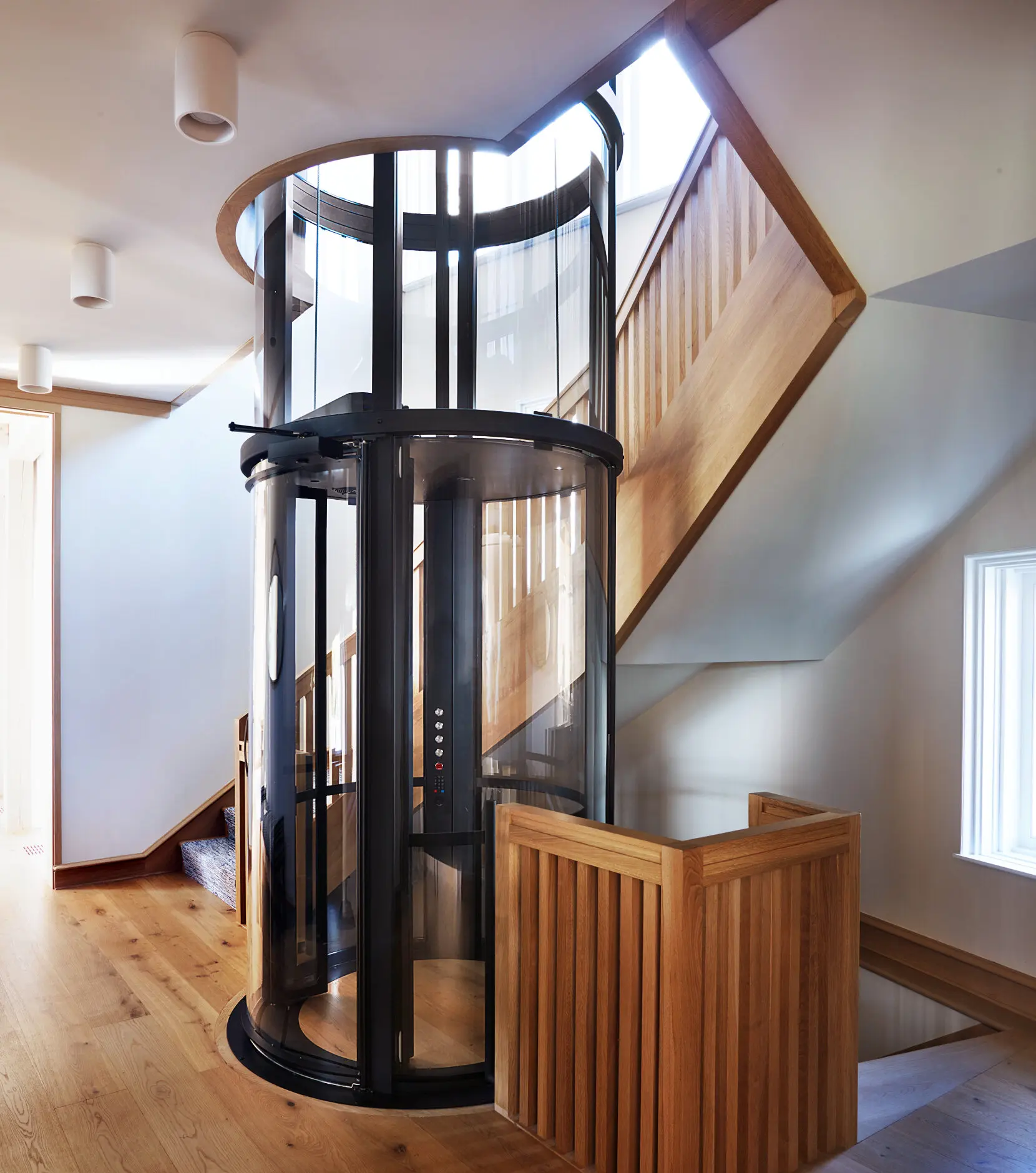 A pneumatic elevator looks sleek and generally takes up less room than a traditional elevator.