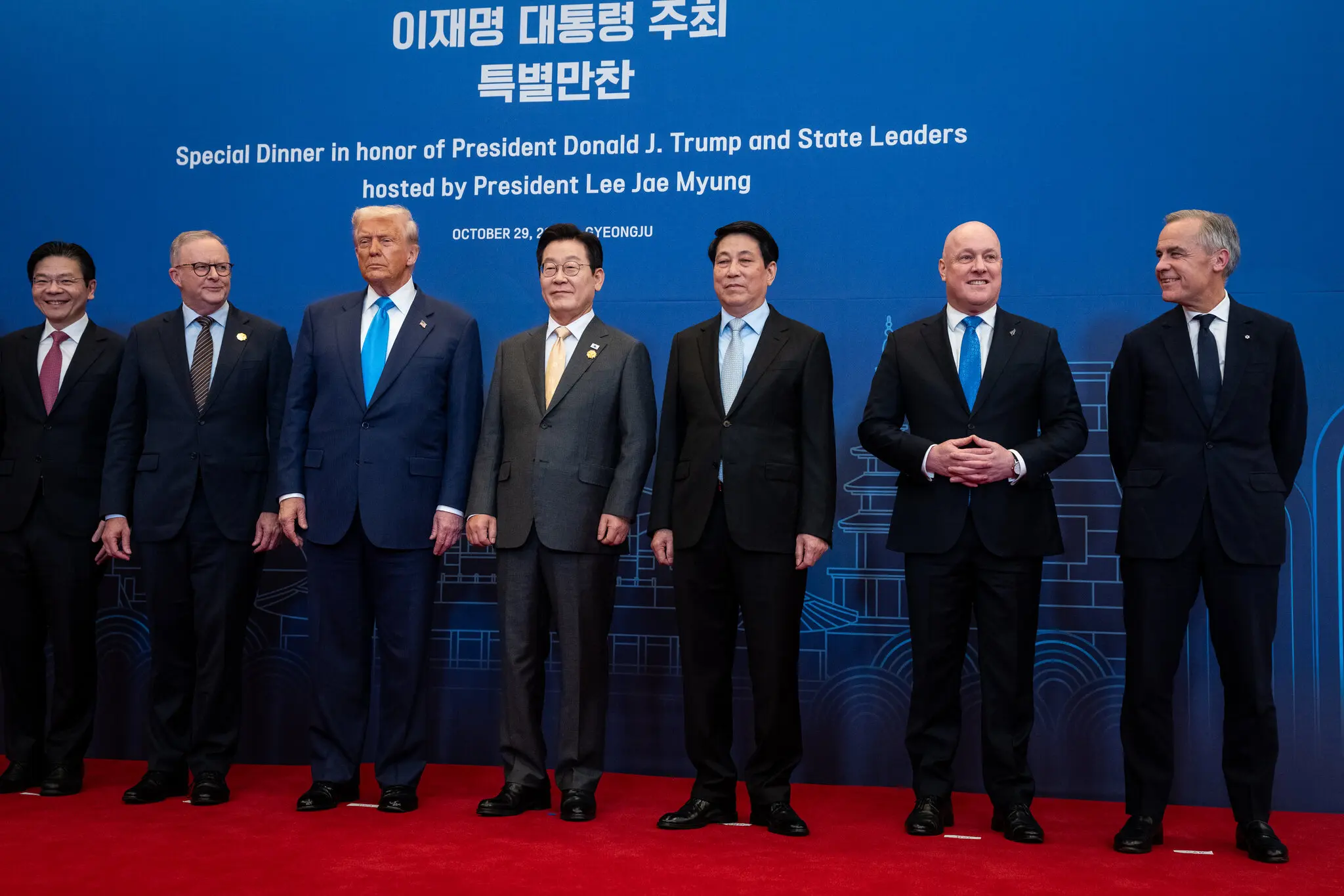 President Trump and Prime Minister Mark Carney of Canada, right, attended a dinner hosted by South Korean President Lee Jae Myung in Gyeongju, South Korea, on Wednesday.