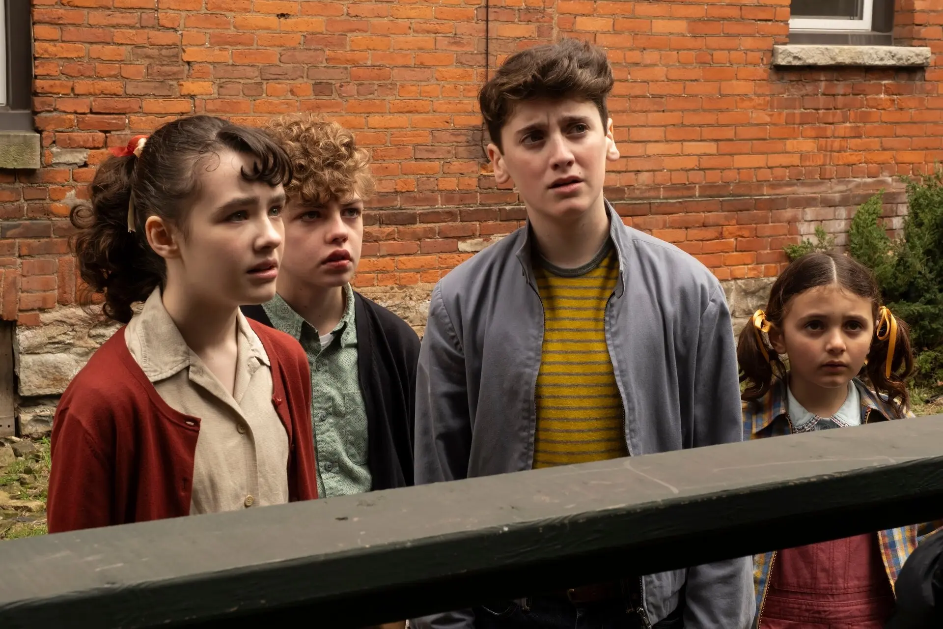 From left, Clara Stack, Mikkal Karim-Fidler, Jack Molloy Legault and Matilda Legault in “It: Welcome to Derry,” which is set in the timeline established by the two “It” movies from 2017 and 2019.