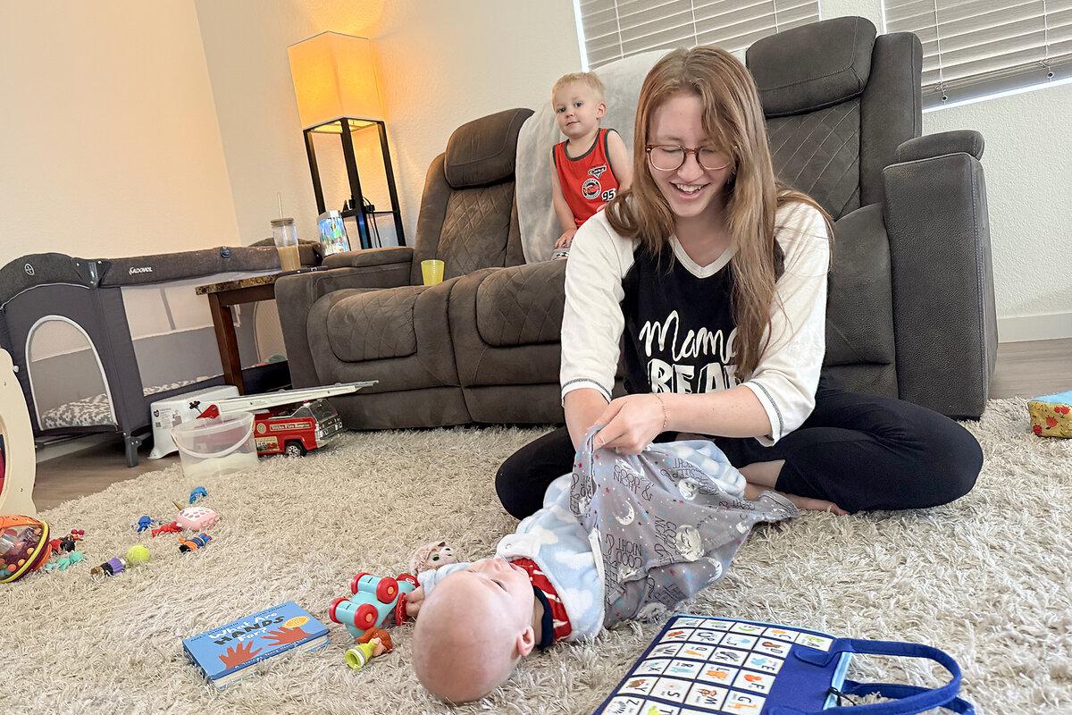 Bekah Harmon plays with her sons Levi (back left), and Cody, at their home in Evans, Colorado, Sept. 19, 2025. Ms. Harmon searched for a church that was both a good fit with her faith and included other women her age. She found one in nearby Greeley.