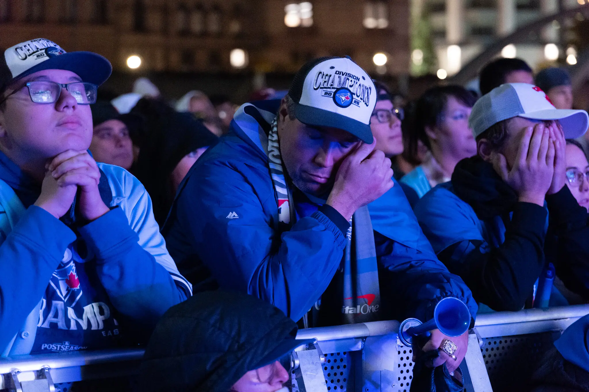 Blue Jays fans in Toronto reacting after their team lost in Saturday’s Game 7.