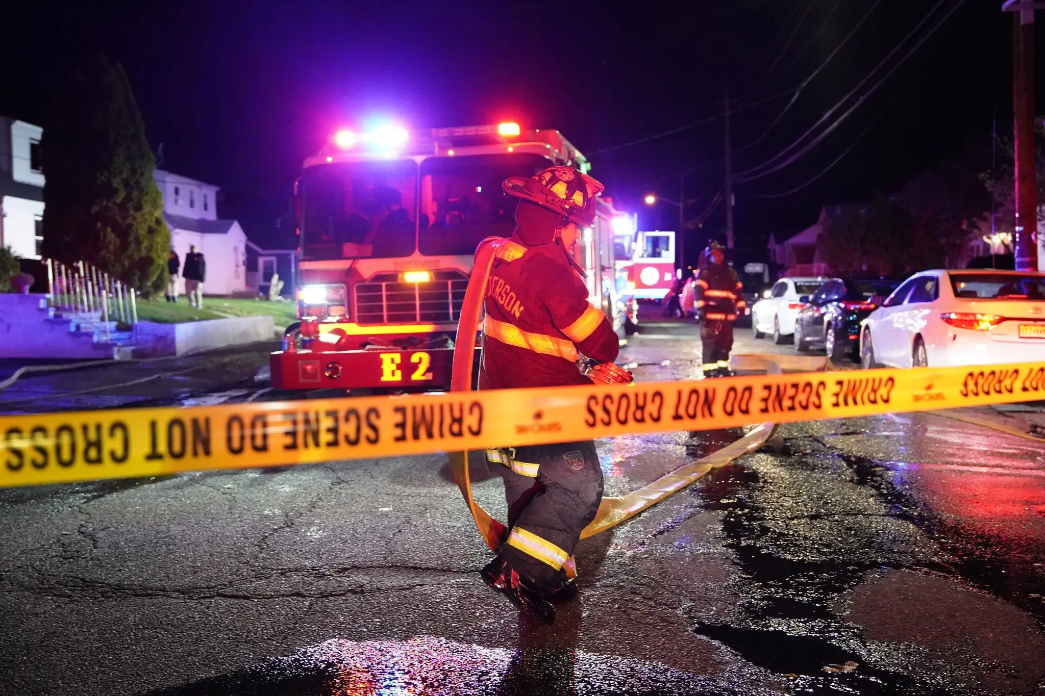 Firefighters responding on Emerson Avenue in Paterson, N.J. on Friday night. “People are going to read that there were five fatalities,” the Paterson mayor, André Sayegh, said. “But that’s a family of five.”