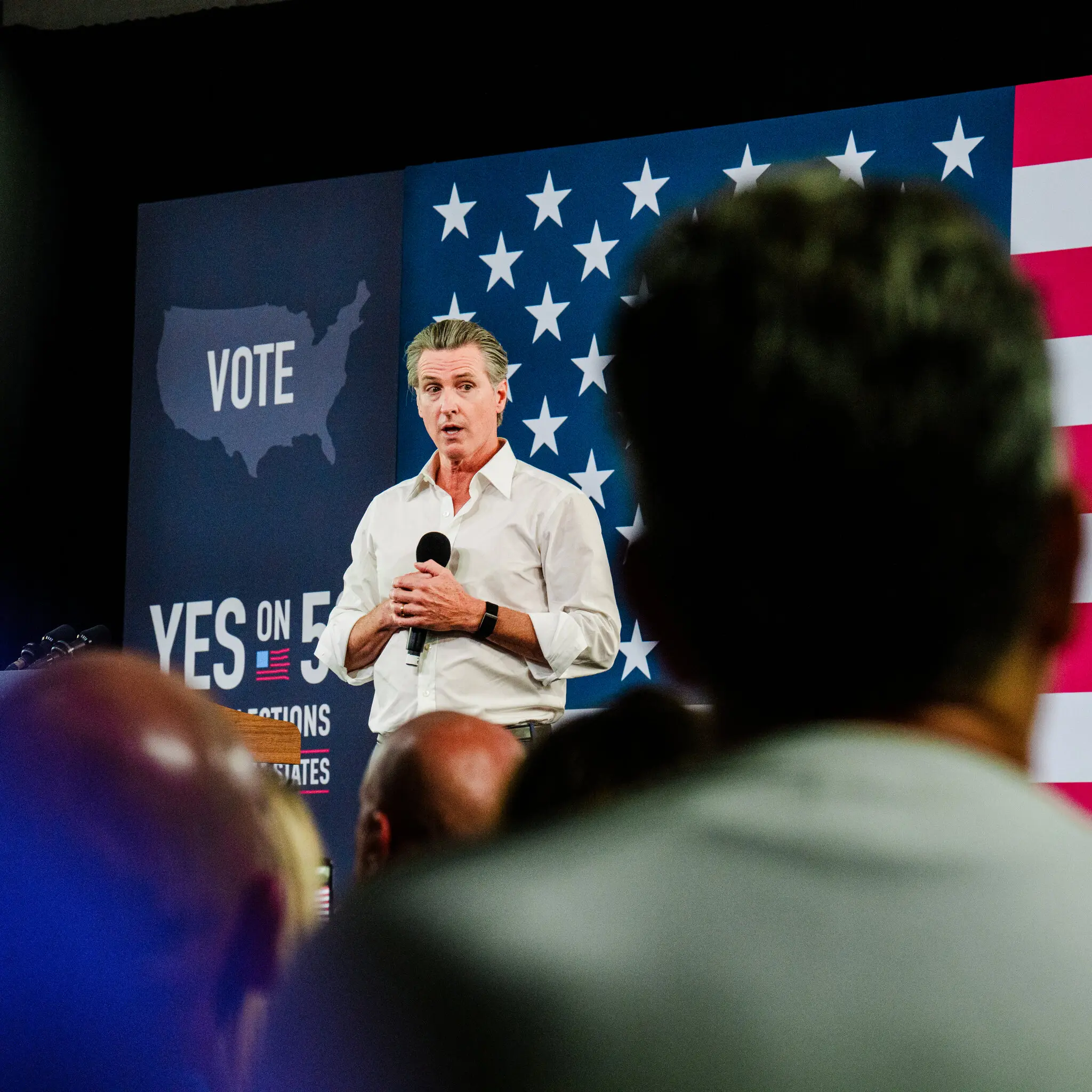 Gov. Gavin Newsom of California speaks to voters at a rally for Proposition 50.
