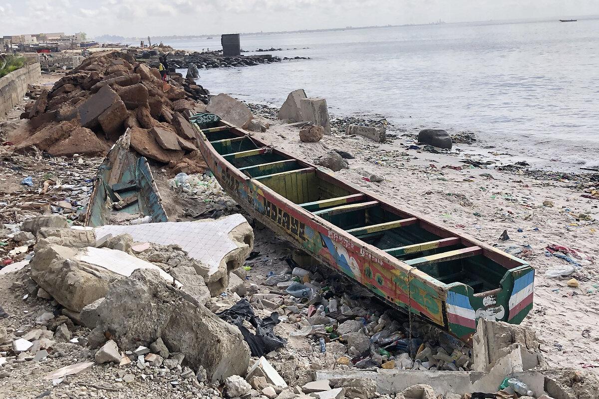 When major storms roll in, residents grab anything they can find to protect their homes from the waves: old tires, shells, wooden boats, and plastic garbage strewn on the beach in Hann Bay, Senegal, Sept. 25, 2025.