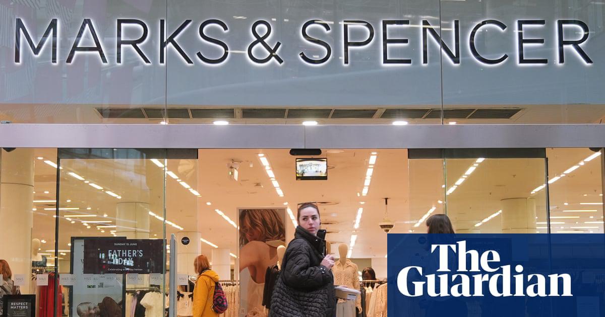 M&S says underlying profits more than halved to £184.1m in the six months to 27 September from £413.1m a year before.