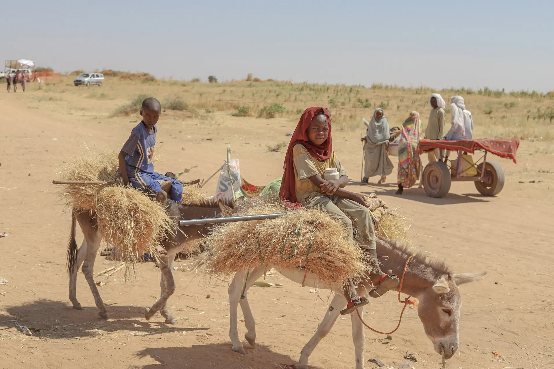 Refugees from paramilitary violence in El Fasher, in a camp in Tawila, Sudan.