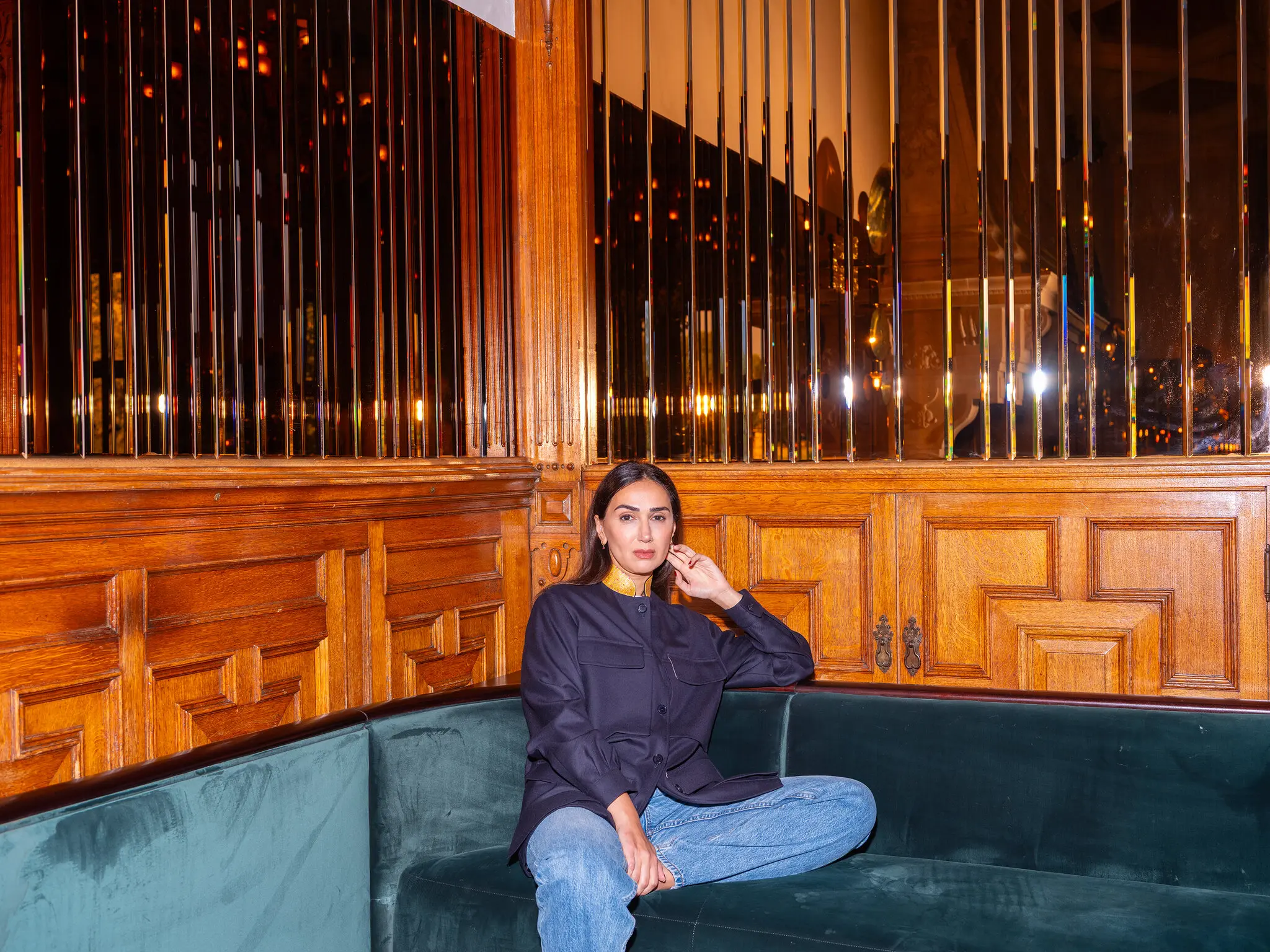 Eiesha Bharti Pasricha — wearing the Yatra jacket from her new clothing line, Lady E — photographed in the billiards room at Estelle Manor in Oxfordshire, England, on Sept. 11, 2025.