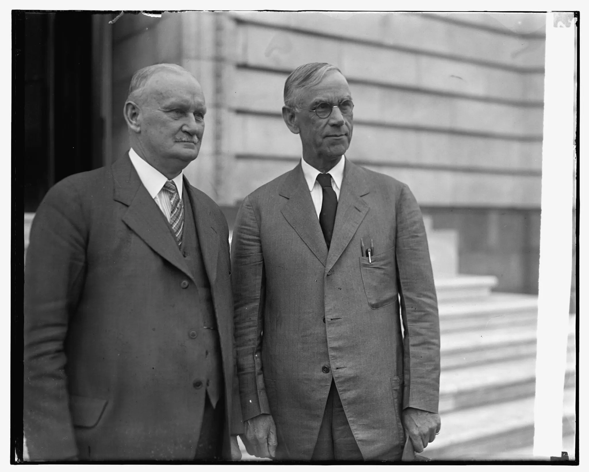 The tariff promoted by Representative Willis Hawley, left, and Senator Reed Smoot seemed like a good idea until it helped set off a collapse of global trade that intensified the Great Depression.