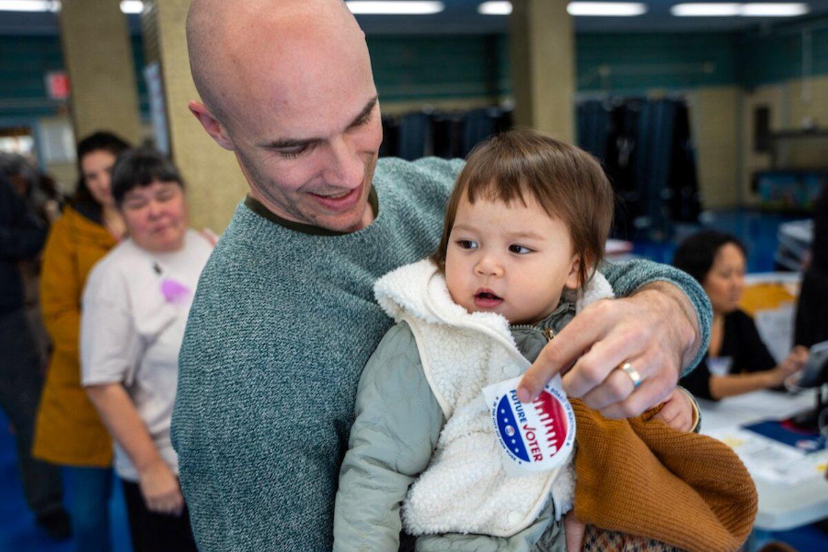 A young child sports a "future voter" sticker at a polling site in Brooklyn, New York City, during the Nov. 4 mayoral election — which saw the highest voter turnout in decades.