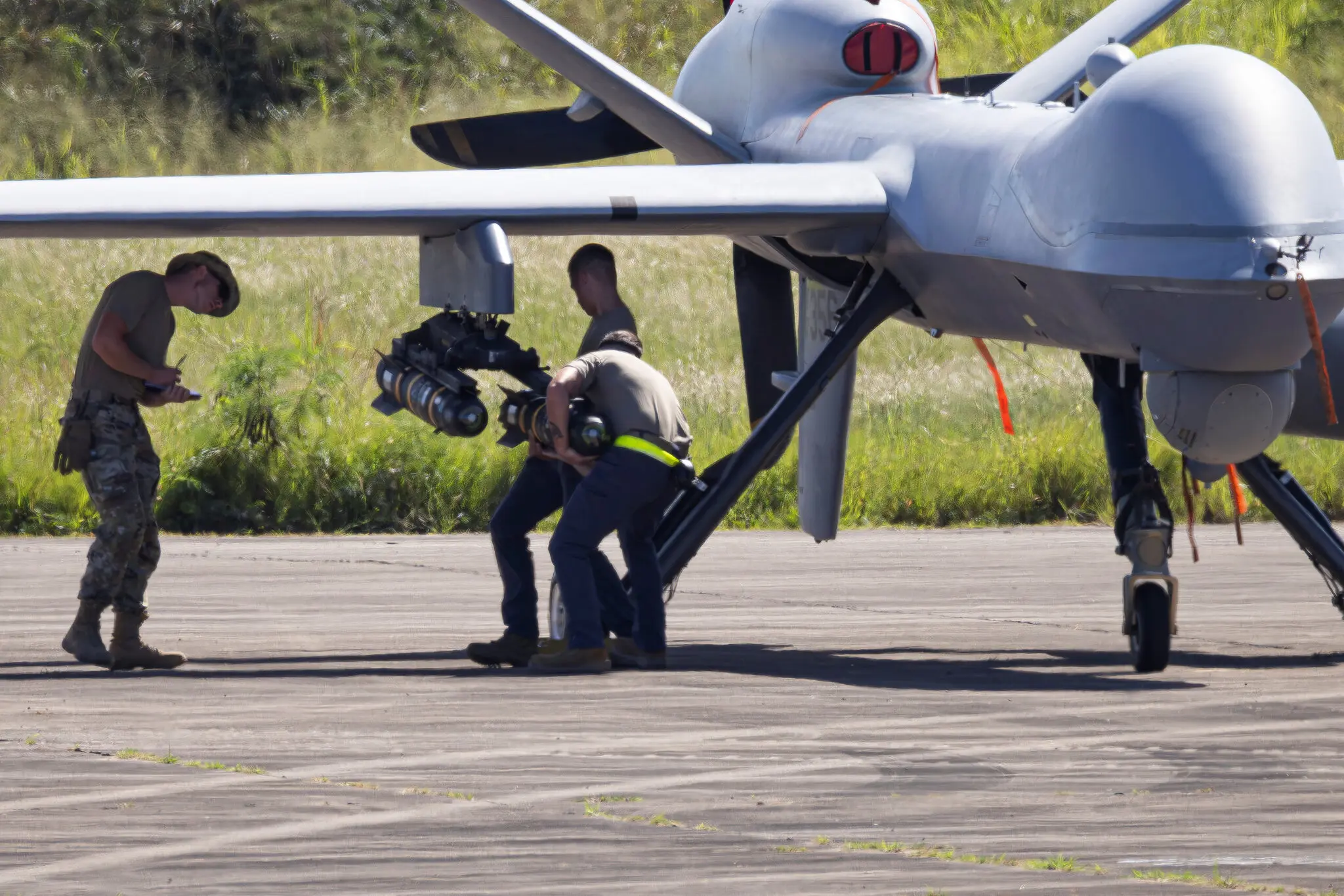 Air Force personnel arming an MQ-9 Reaper drone with missiles in Aguadilla, Puerto Rico, earlier this month.
