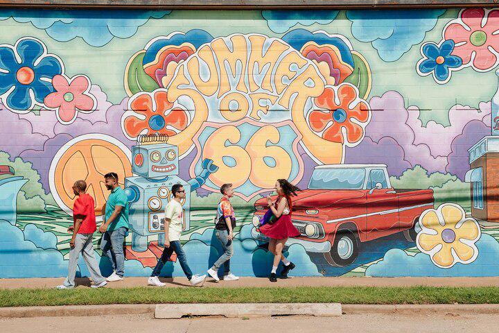 This intricate mural in Oklahoma City's 39th Street District features several symbols for the US's most famous highway, including the Route 66 Robot and the Milk Bottle Grocery Building.