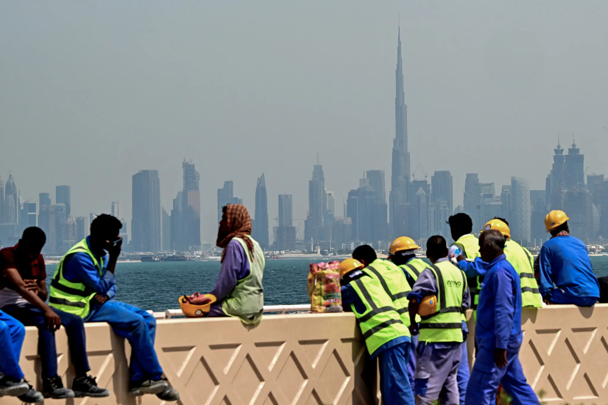 Migrant workers taking a break in Dubai this month.