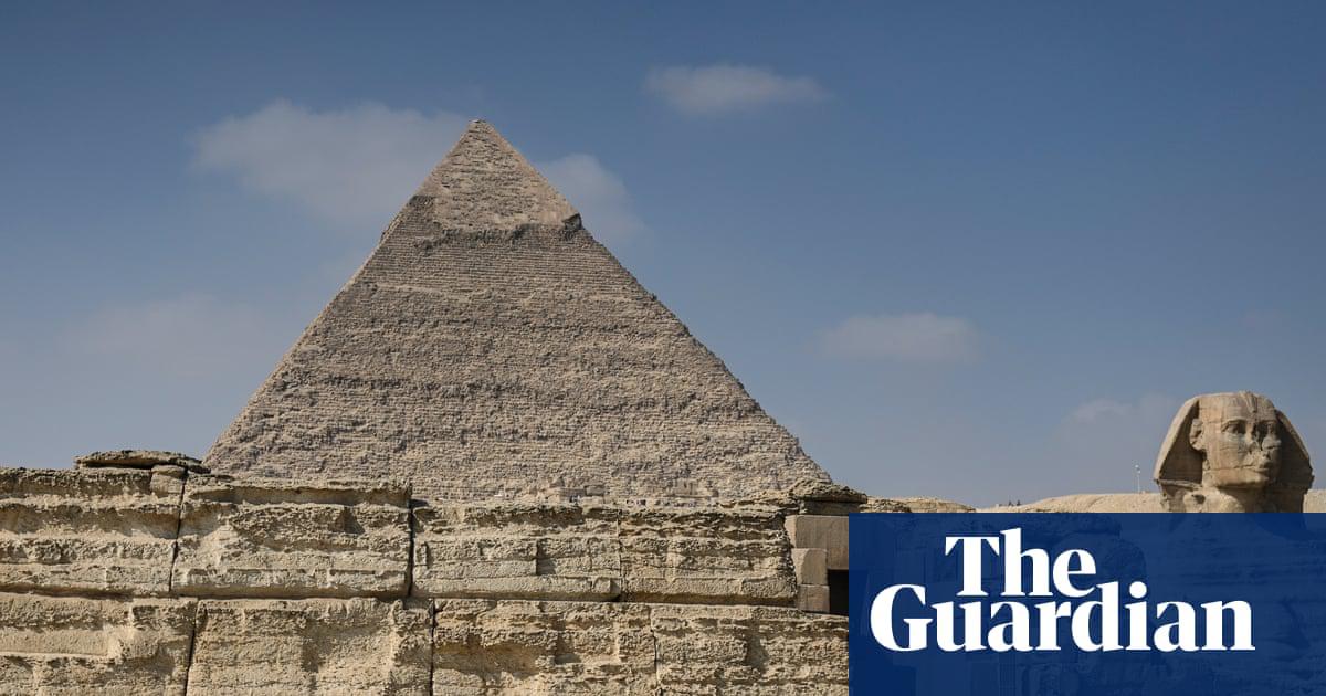 Tourists visit the Giza Plateau in Egypt. The biggest drop in bookings for easyJet are flights to Egypt, Turkey and Cyprus.