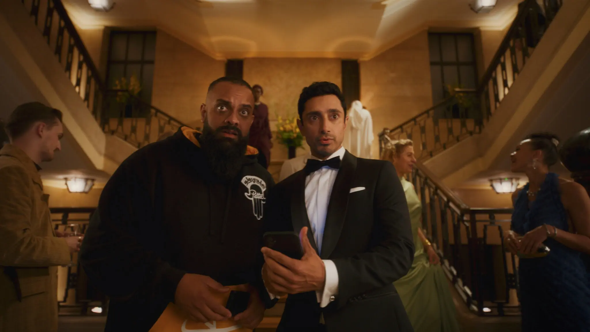 Riz Ahmed, right, with Guz Khan, wrote and stars in “Bait,” about an actor with complicated feelings about becoming James Bond.