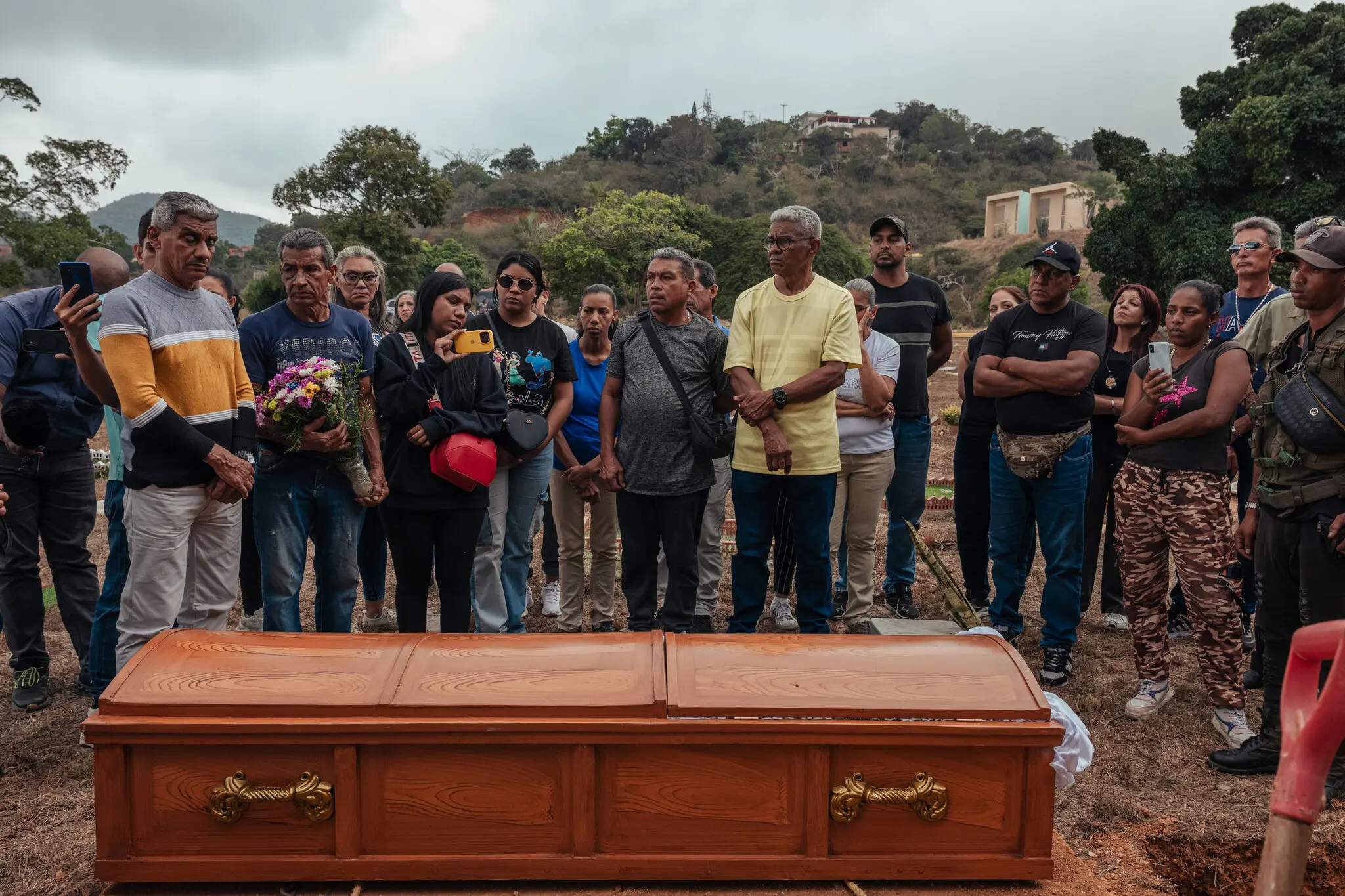 Friends and family at the burial of Rosa Elena González, 80, who was killed during the U.S. raid to capture Venezuela’s president, Nicolás Maduro.